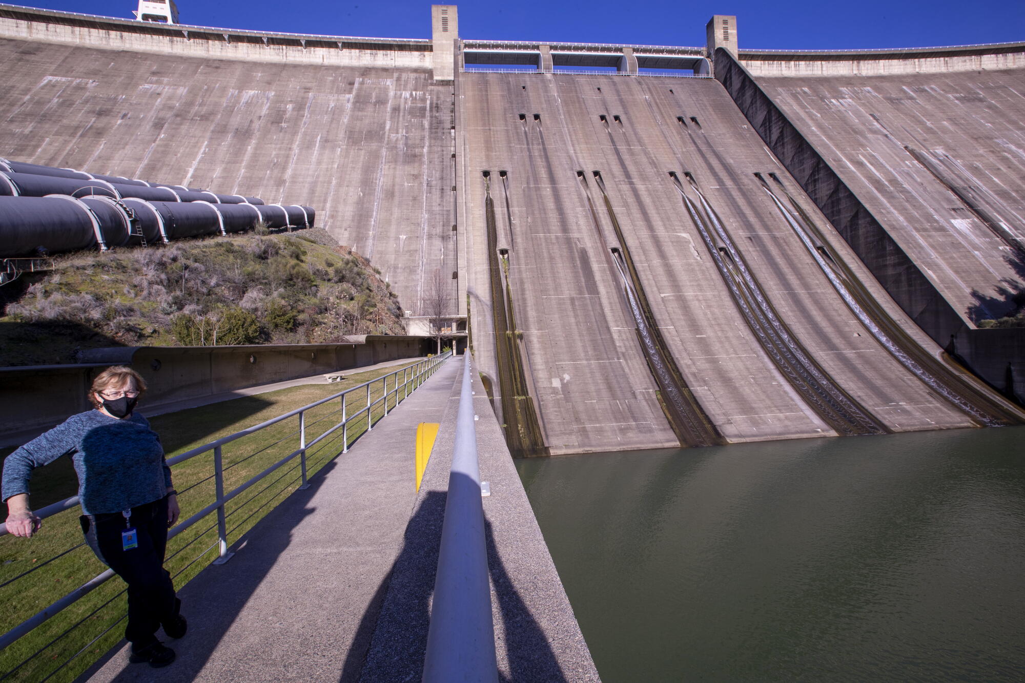 Shasta Dam stands 602 feet tall. 