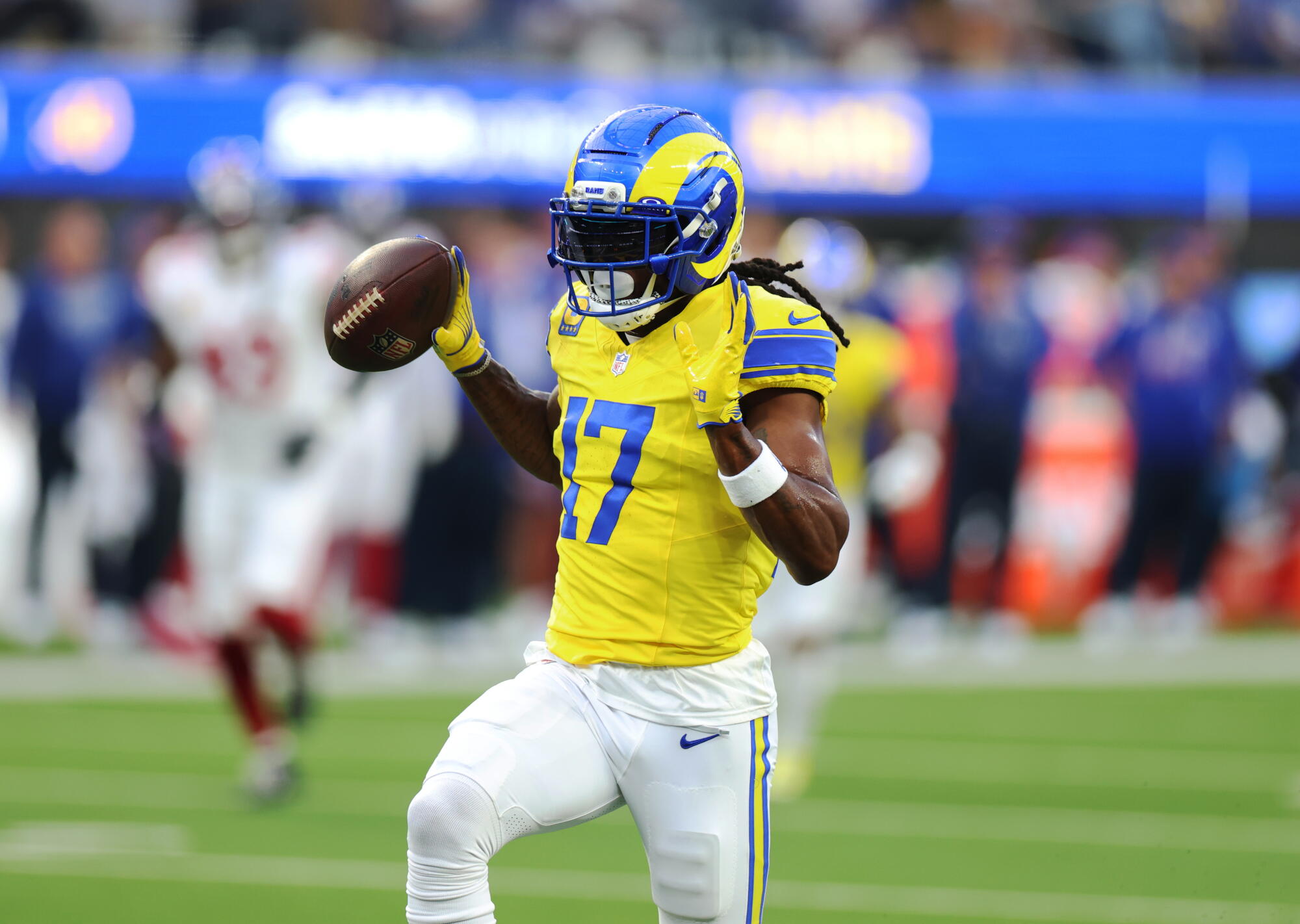 Rams wide receiver Davante Adams celebrates after catching a touchdown pass against the Giants.