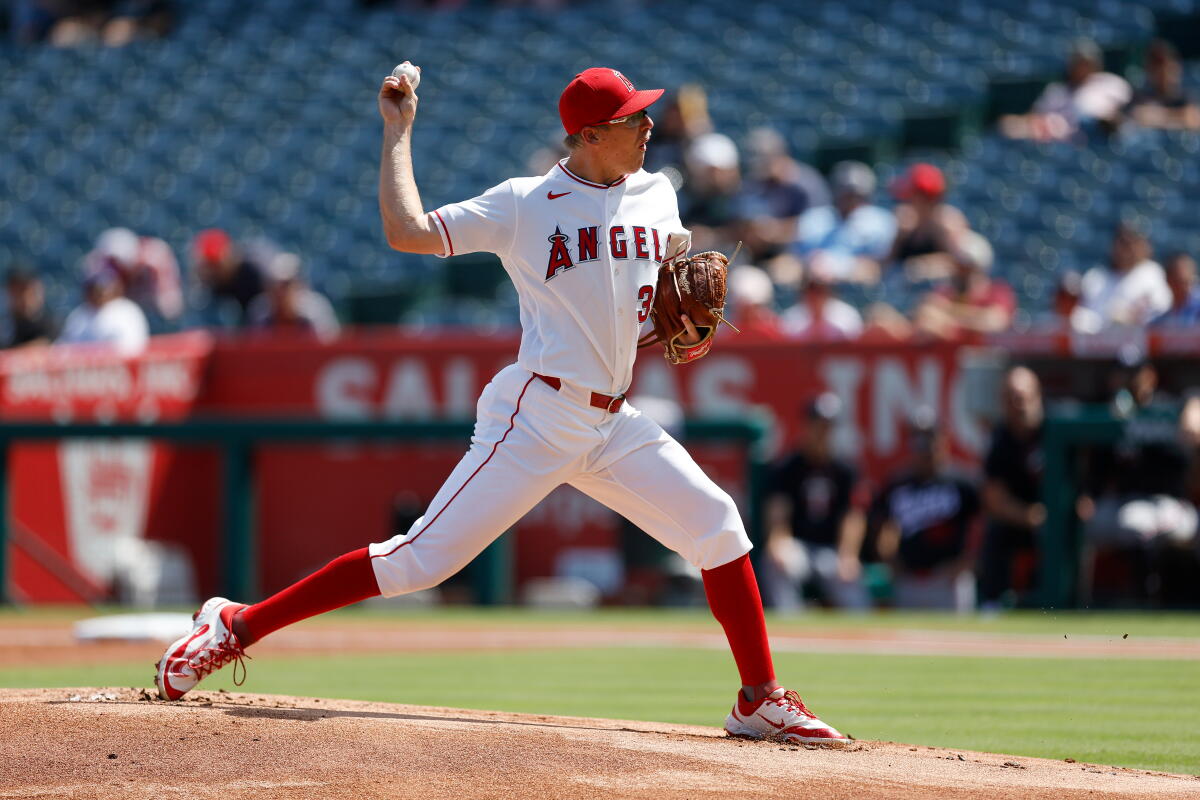 Angels starting pitcher Ryan Johnson throws during the first inning.