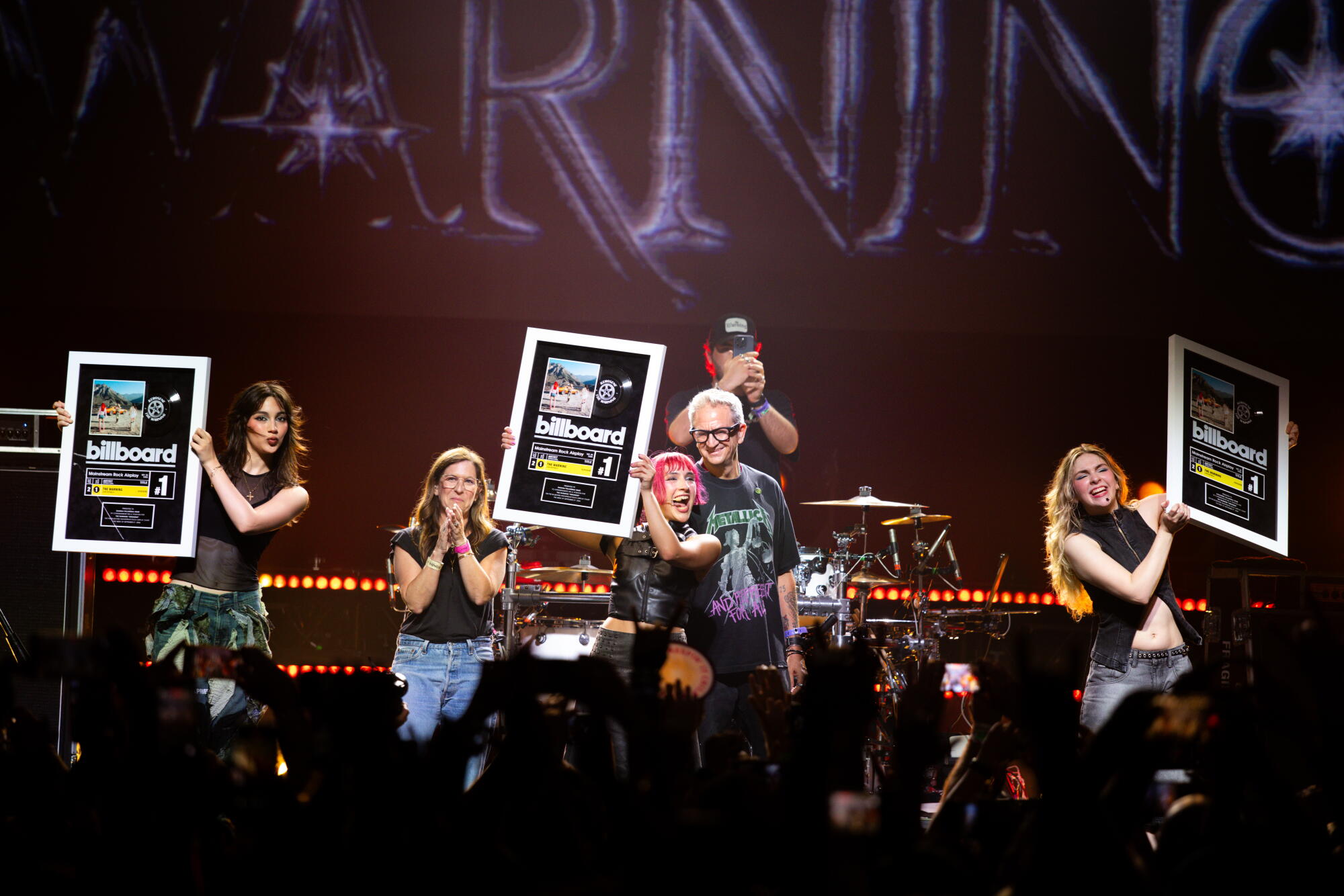 Rock band, The Warning, members Alejandra Villarreal, left, Paulina Villarreal, center, and Daniela Villarreal, right.