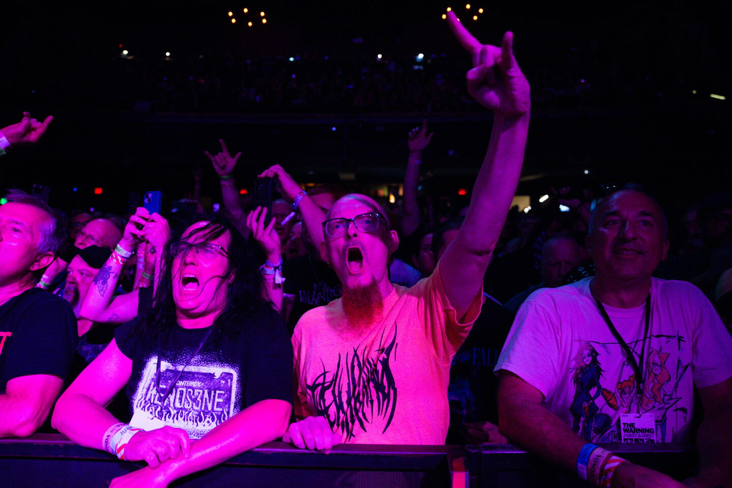 Fans sing during the rock band, The Warning's, performance