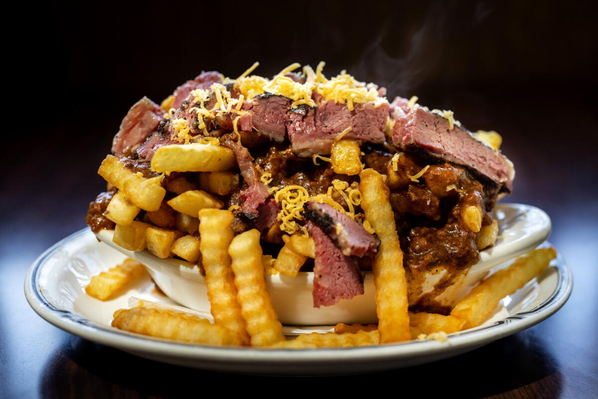 LOS ANGELES, CA - October 18: At Langer's Deli, the very popular, pastrami chili cheese fries, photographed in Los Angeles, CA, Langer's Deli, Monday, Oct. 18, 2021. 