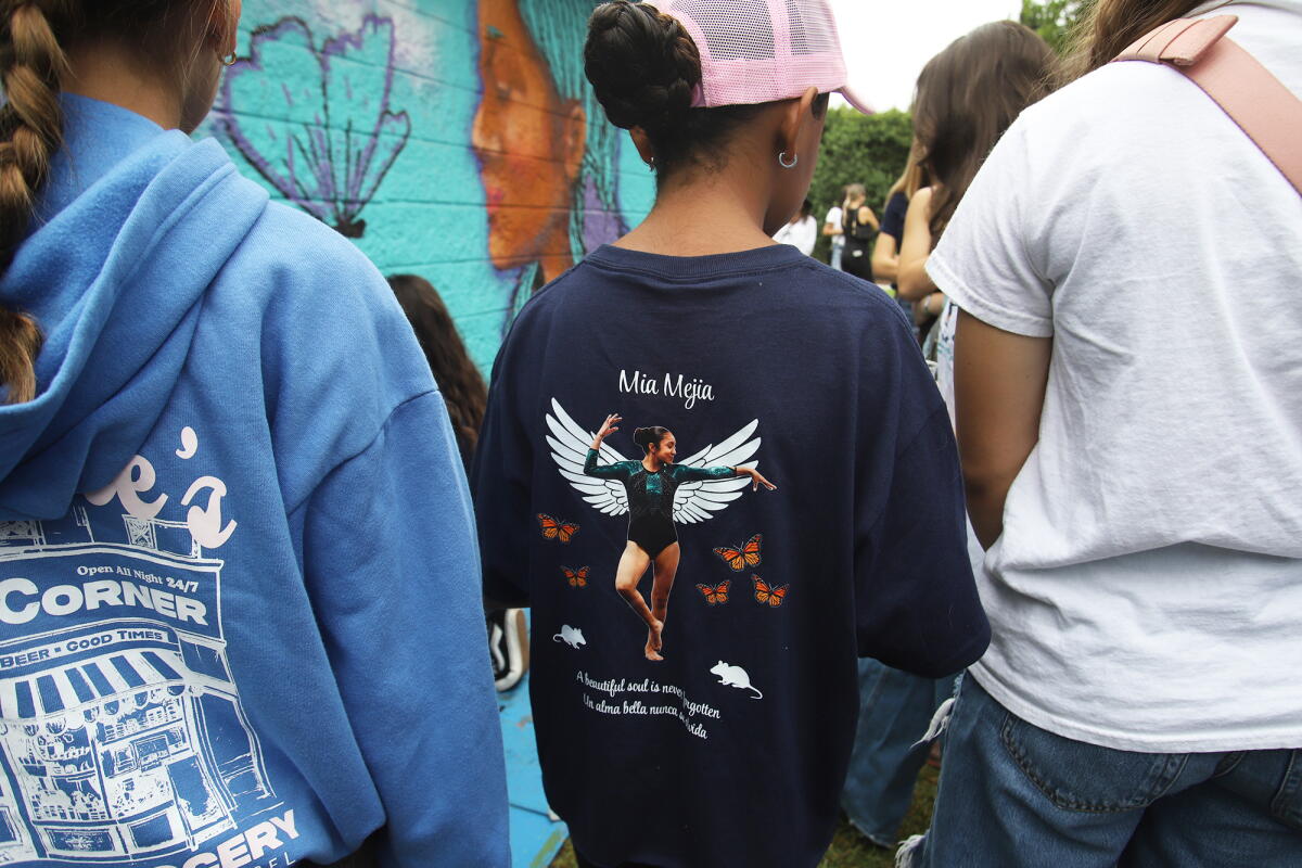 A friend of Mia Mejia wears a shirt designed in her memory.