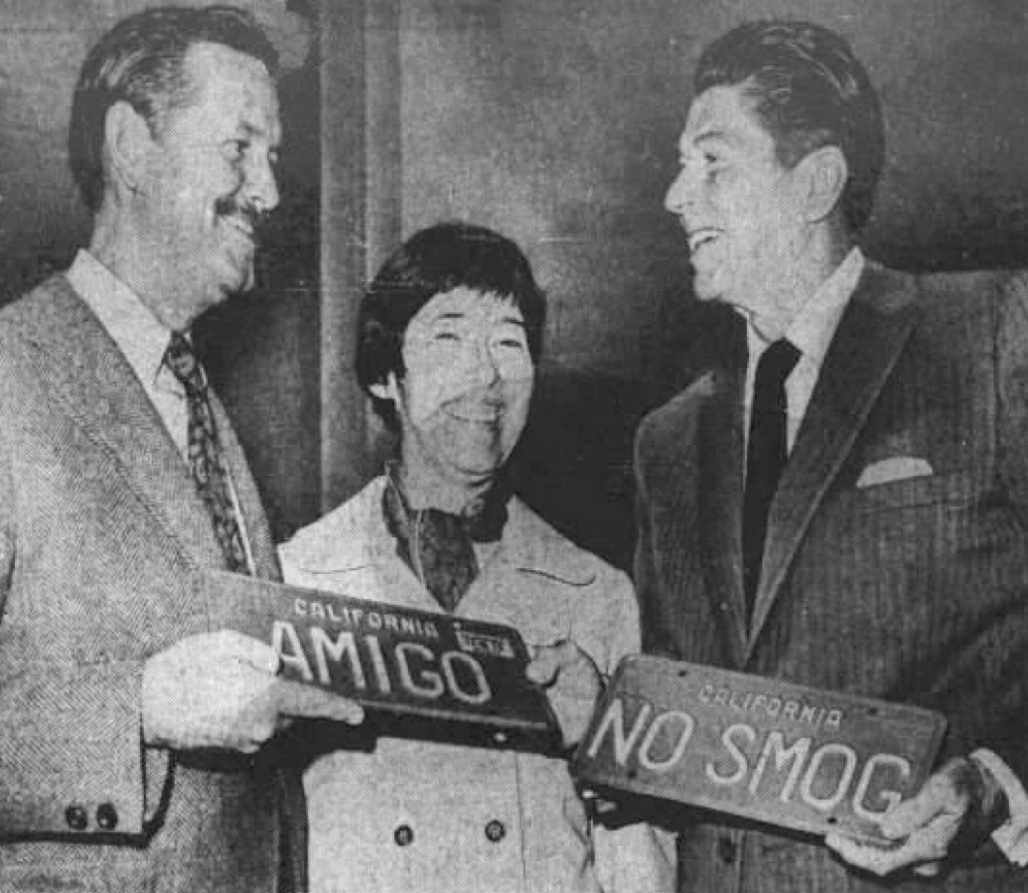 Mr. And Mrs. Robert Klees receiving a personalized license plate from then-Gov. Ronald Reagan in 1970.