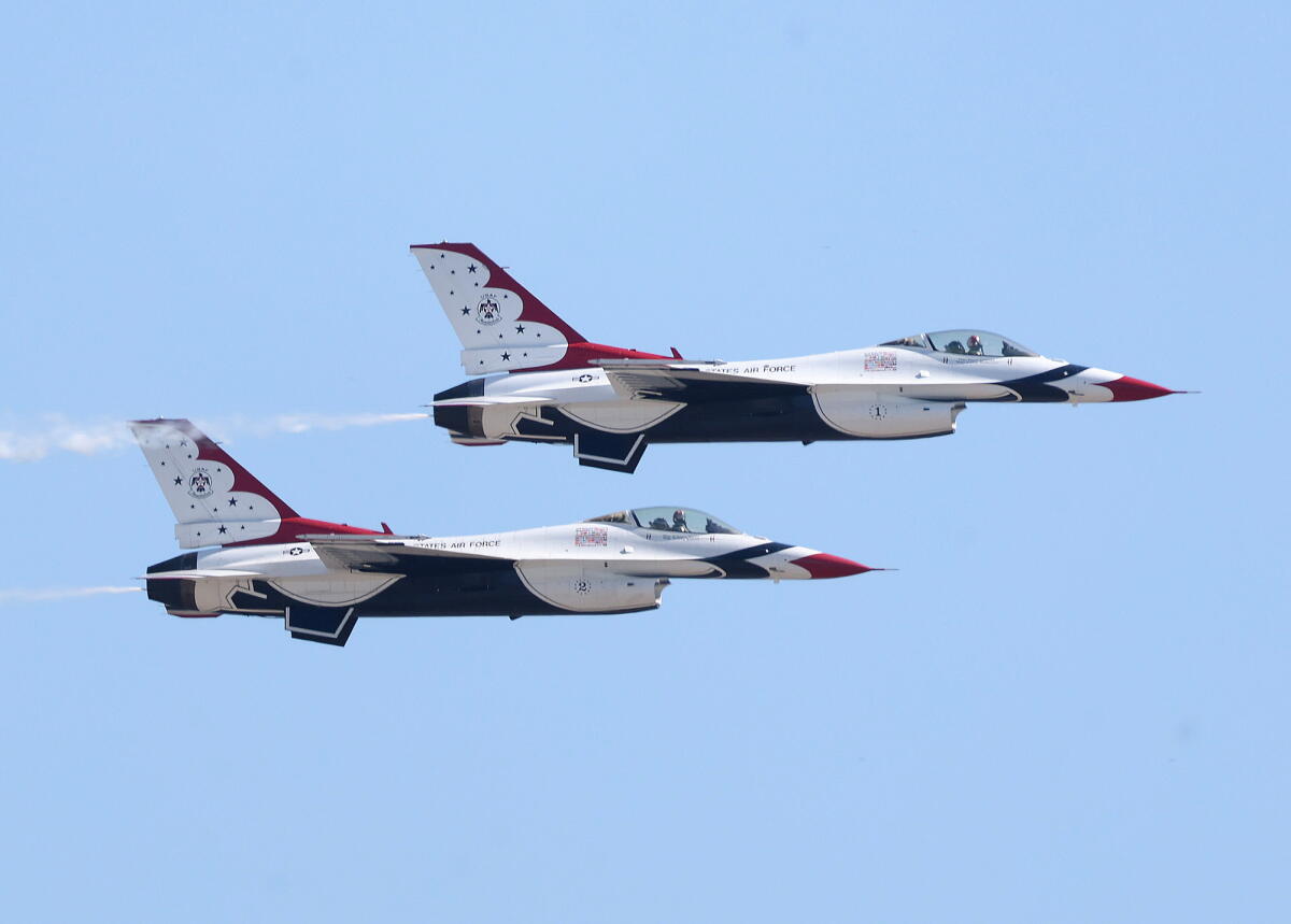 Two U.S. Air Force Thunderbird jets arrive to to the Joint Forces Training Base in Los Alamitos on Tuesday.