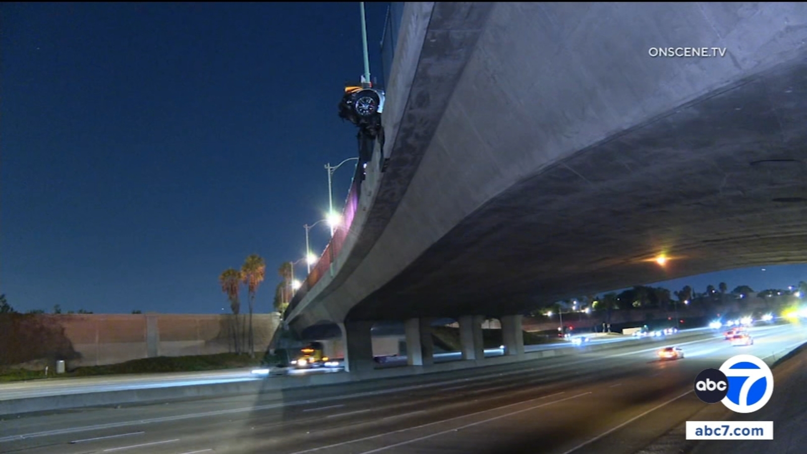 Corvette hangs from 5 Freeway overpass after Anaheim crash