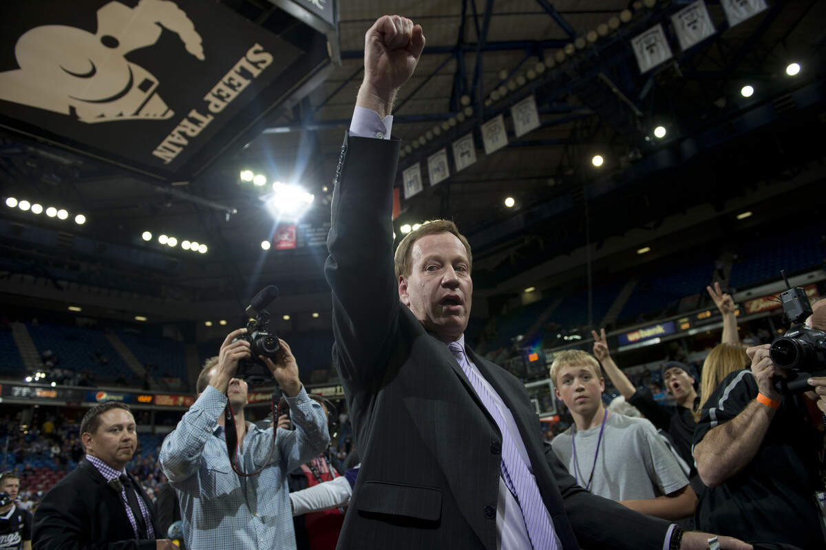 Grant Napear raises a fist Wednesday, April 17, 2013, as he thanks fans after the Sacramento Kings’ 112-108 loss to the Los Angeles Clippers at Sleep Train Arena in Sacramento after the team’s final game of the season. With the franchise considering a move, many in attendance believed that it could be the Kings’ final game in Sacramento.