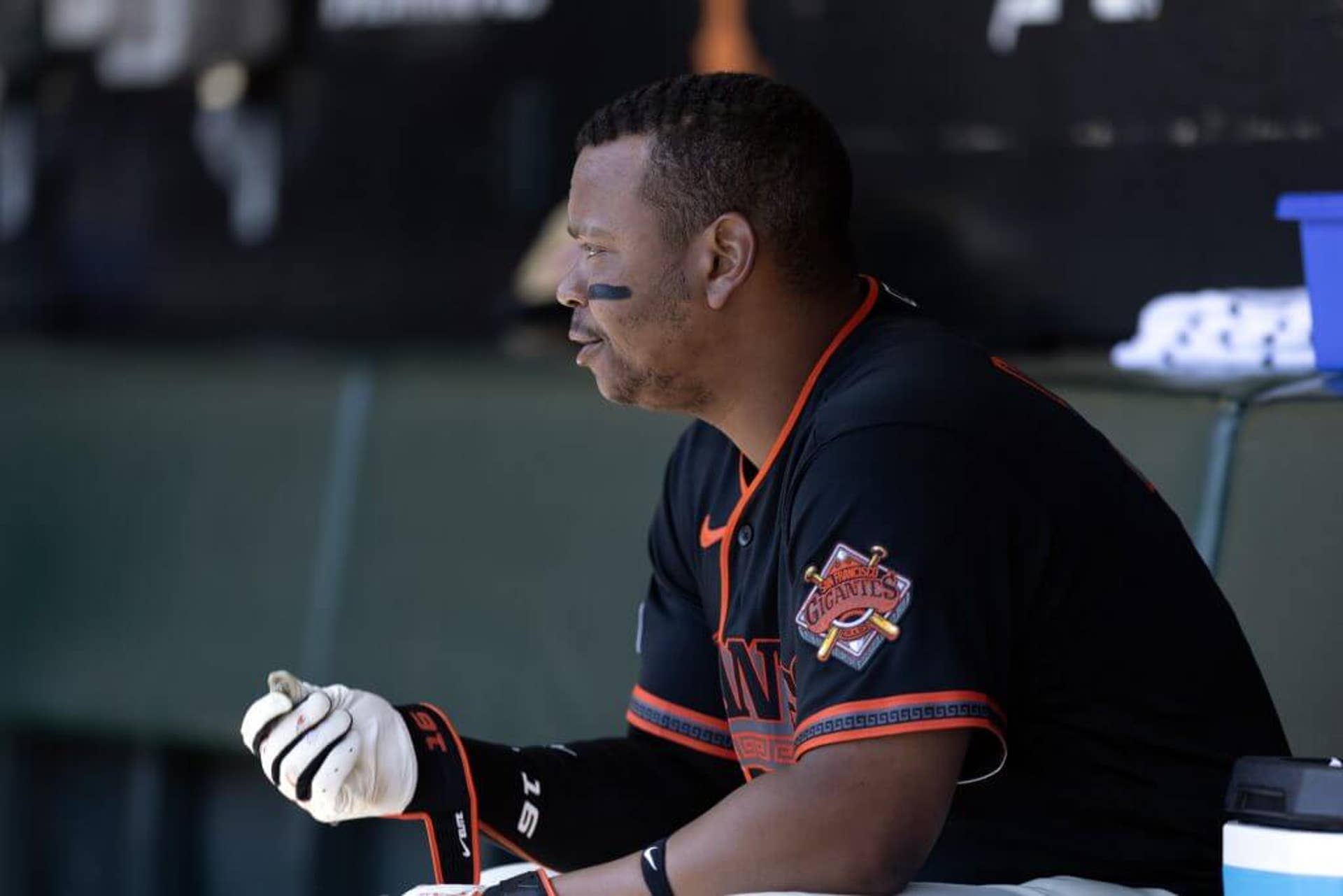Rafael Devers (16) watches the action from the dugout against the San Diego Padres at Oracle Park.