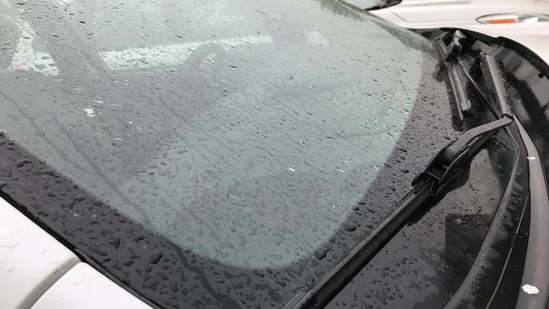 Rain is seen on a vehicle in the Eyewitness News parking lot in Bakersfield, Calif., Wednesday, Feb. 13, 2019. (KBAK/KBFX photo)