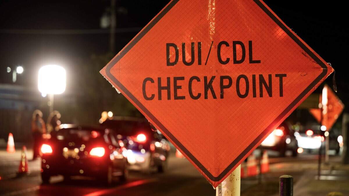 Cars slow for a police DUI/driver’s license checkpoint in Sacramento on Aug. 14, 2026. The Elk Grove Police Department will hold a sobriety and driver’s license checkpoint at an undisclosed location Friday from 7 p.m. to 3 a.m. Saturday.