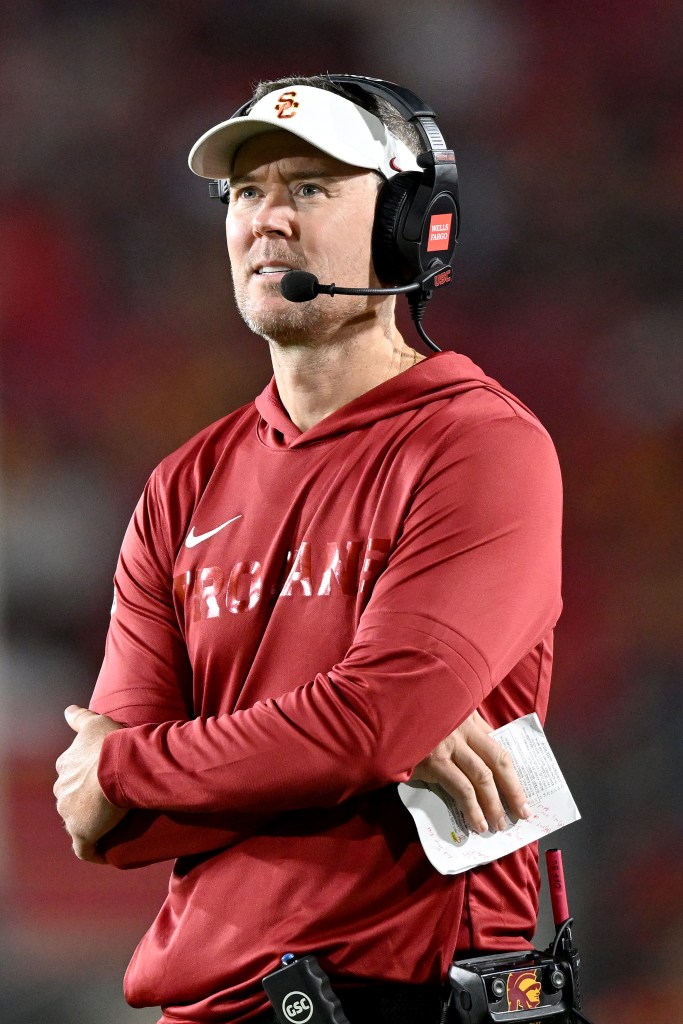 USC coach Lincoln Riley watching the game from the sidelines.