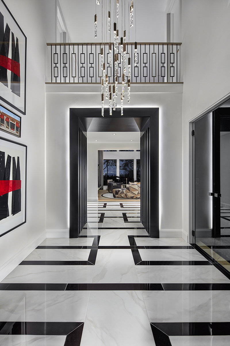 A bold, yet minimalist foyer inside an Oakland Township home.