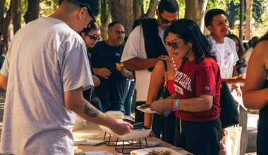 Line of parents getting food at a buffet at LEAD Move-In Weekend