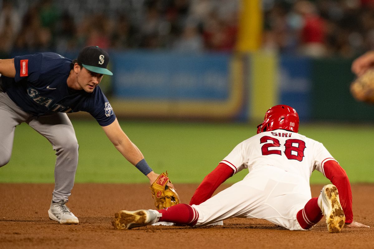Los Angeles Angels center outfielder Jose Siri (28) slides back to second base during an MLB match between Seattle Mariners and Los Angeles Angels on Monday, September 14, 2026 at Angel Stadium in Anaheim, California.