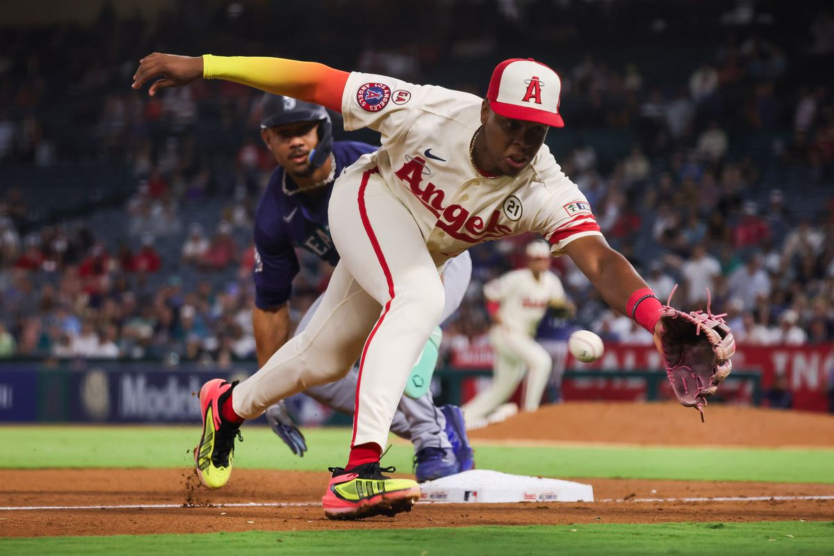 Los Angeles Angels infielder Denzer Guzman (23) reaches for the ball during the MLB game against the Seattle Mariners Tuesday September 15th, 2026 at Angel Stadium in Anaheim, Calif.