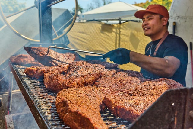man grilling seasoned meat on a large barbecue grill, heritage barbecue, a santa maria style tri tip sizzles on the grill at heritage barbecue in san juan capistrano california, 25 restaurants defining california dining man grilling seasoned meat on a large barbecue grill, heritage barbecue, a santa maria style tri tip sizzles on the grill at heritage barbecue in san juan capistrano california, 25 restaurants defining california dining