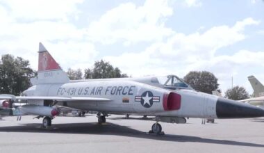 Volunteers clean historic military planes at California museum