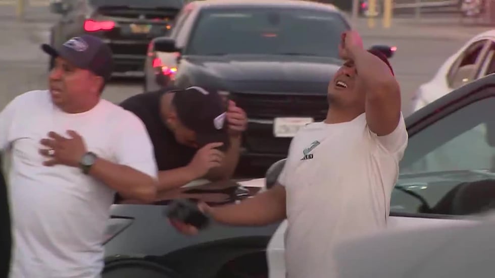 Man reacts with anguish after learning of Los Angeles helicopter crash.