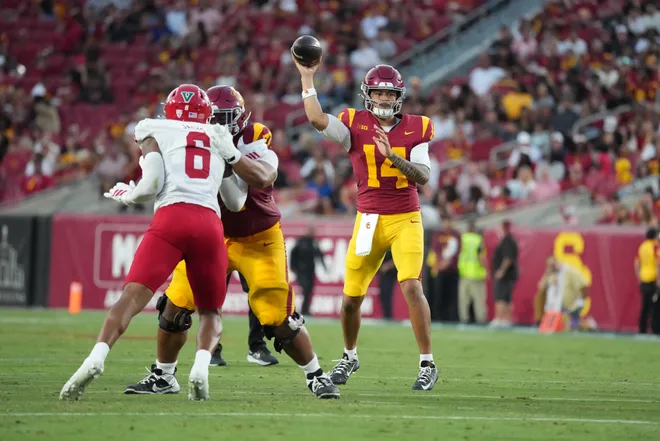 Sep 4, 2026; Los Angeles, California, USA; Southern California Trojans quarterback Jayden Maiava (14) throws the ball against the Fresno State Bulldogs in the first half at United Airlines Field at Los Angeles Memorial Coliseum. Mandatory Credit: Kirby Lee-Imagn Images