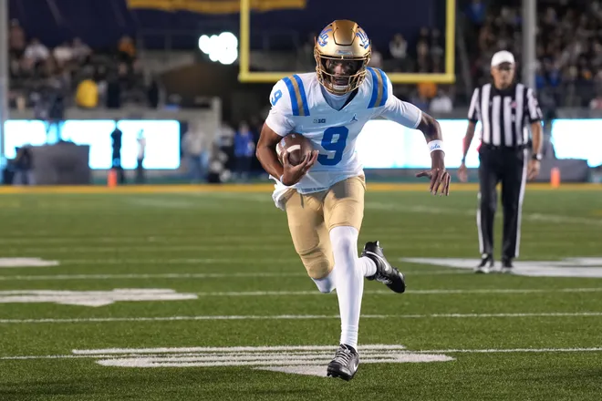 Sep 5, 2026; Berkeley, California, USA; UCLA Bruins quarterback Nico Iamaleava (9) rushes for a touchdown against the California Golden Bears during the first quarter at California Memorial Stadium. Mandatory Credit: Darren Yamashita-Imagn Images