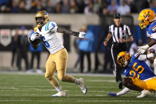 Sep 5, 2026; Berkeley, California, USA; UCLA Bruins running back Anthony Woods (6) breaks free of the California Golden Bears defense to score a touchdown during the second quarter at California Memorial Stadium. Mandatory Credit: Darren Yamashita-Imagn Images