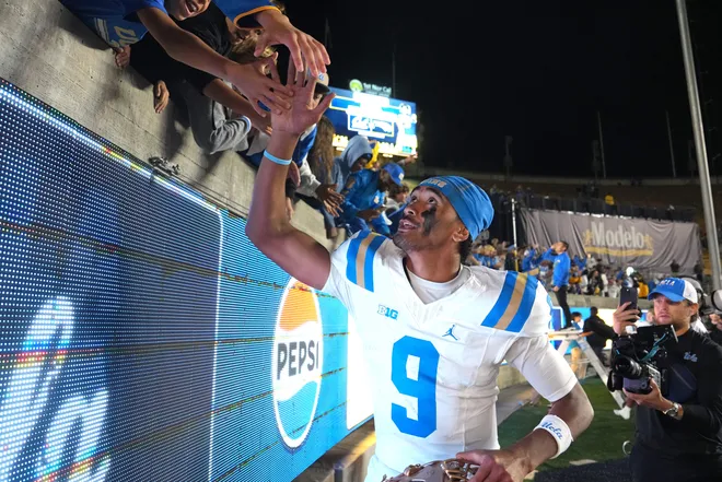 Sep 5, 2026; Berkeley, California, USA; UCLA Bruins quarterback Nico Iamaleava (9) celebrates with fans after defeating the California Golden Bears at California Memorial Stadium. Mandatory Credit: Darren Yamashita-Imagn Images