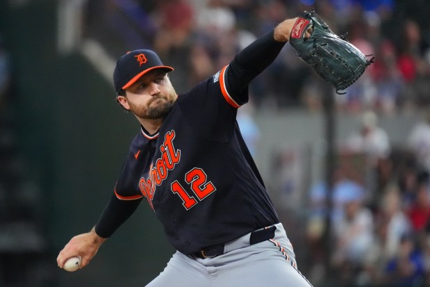 Detroit Tigers starting pitcher Casey Mize throws during the first inning of a baseball game against the Texas Rangers, Sunday, July 5, 2026, in Arlington, Texas. (AP Photo/LM Otero)