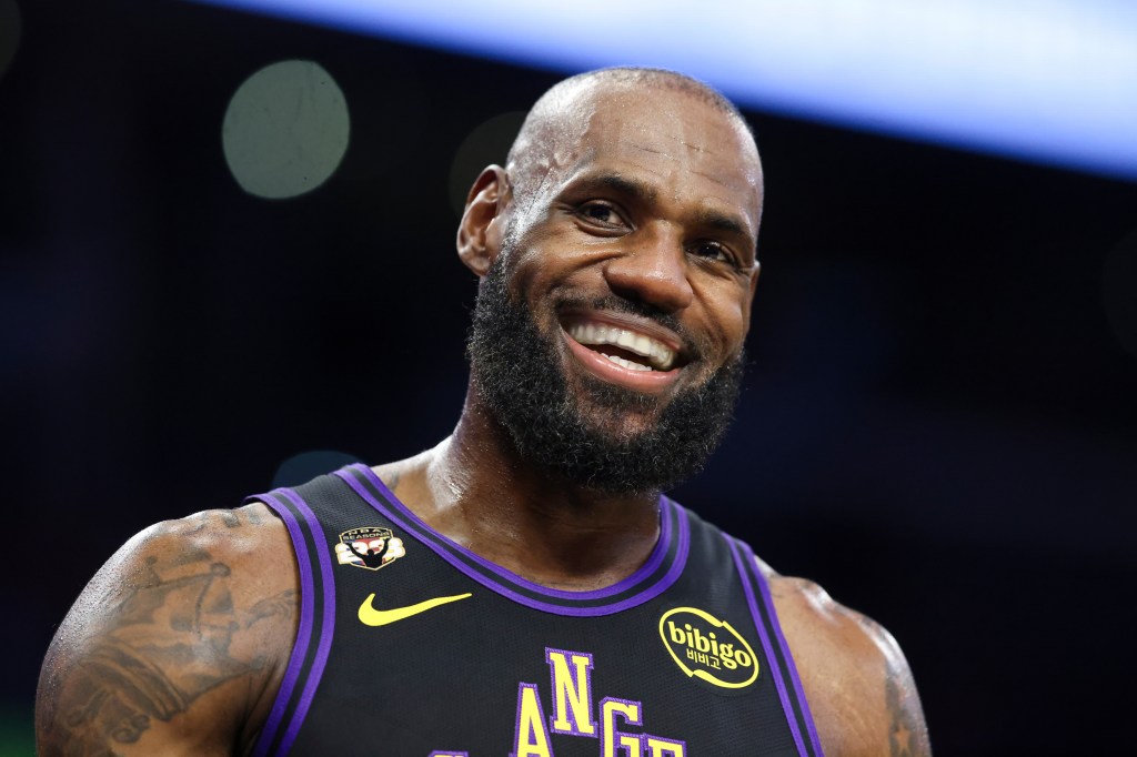 LeBron James smiling in his Lakers uniform.