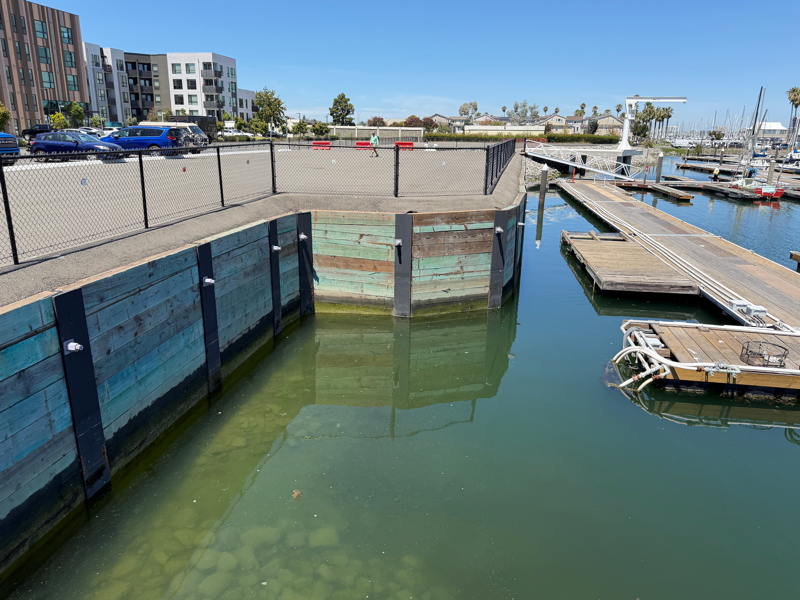 Eight years later the seawall has been repaired but the dry storage remains vacant and the lone hoist unusable.