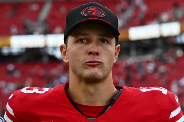 San Francisco 49ers starting quarterback Brock Purdy (13) waits for the television reporter to start her interview after their NFL game at Levi's Stadium in Santa Clara, Calif., on Sunday, Sept. 20, 2026. The San Francisco 49ers defeated the Miami Dolphins 35-13. (Jose Carlos Fajardo/Bay Area News Group)