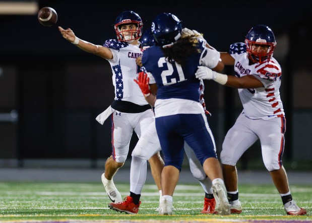 Campolindo's Cayden Mulliken (5) throws the ball against Bellarmine College Prep's Steven Funaki (21) in the second quarter at San Jose City College in San Jose, Calif., on Saturday, Sept. 5, 2026. (Shae Hammond/Bay Area News Group)