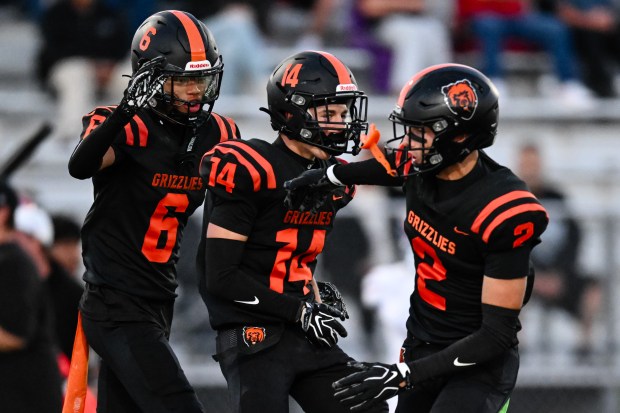 California's Noah Jemo (14), middle, reacts after intercepting a Santa Teresa pass during the first half of a high school football game at California High School in San Ramon, Calif., on Friday, Sept. 11, 2026. (Thien-An Truong for Bay Area News Group)