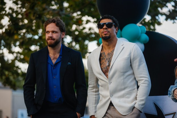 San Jose Sharks' Timothy Liljegren (37), left, and San Jose Sharks' Ryan Reaves (75), right, are introduced on stage during a pregame ceremony before the San Jose Sharks' home opener against the Vegas Golden Knights at the SAP Center in San Jose, Calif., on Thursday, Oct. 9, 2025. (Shae Hammond/Bay Area News Group)