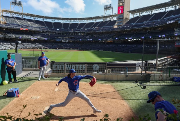 Cubs pitcher Kevin Gausman throws off the mound in the bullpen before Game 1 of their wild-card series against the Padres on Sept. 29, 2026, in San Diego. (Brian Cassella/Chicago Tribune)