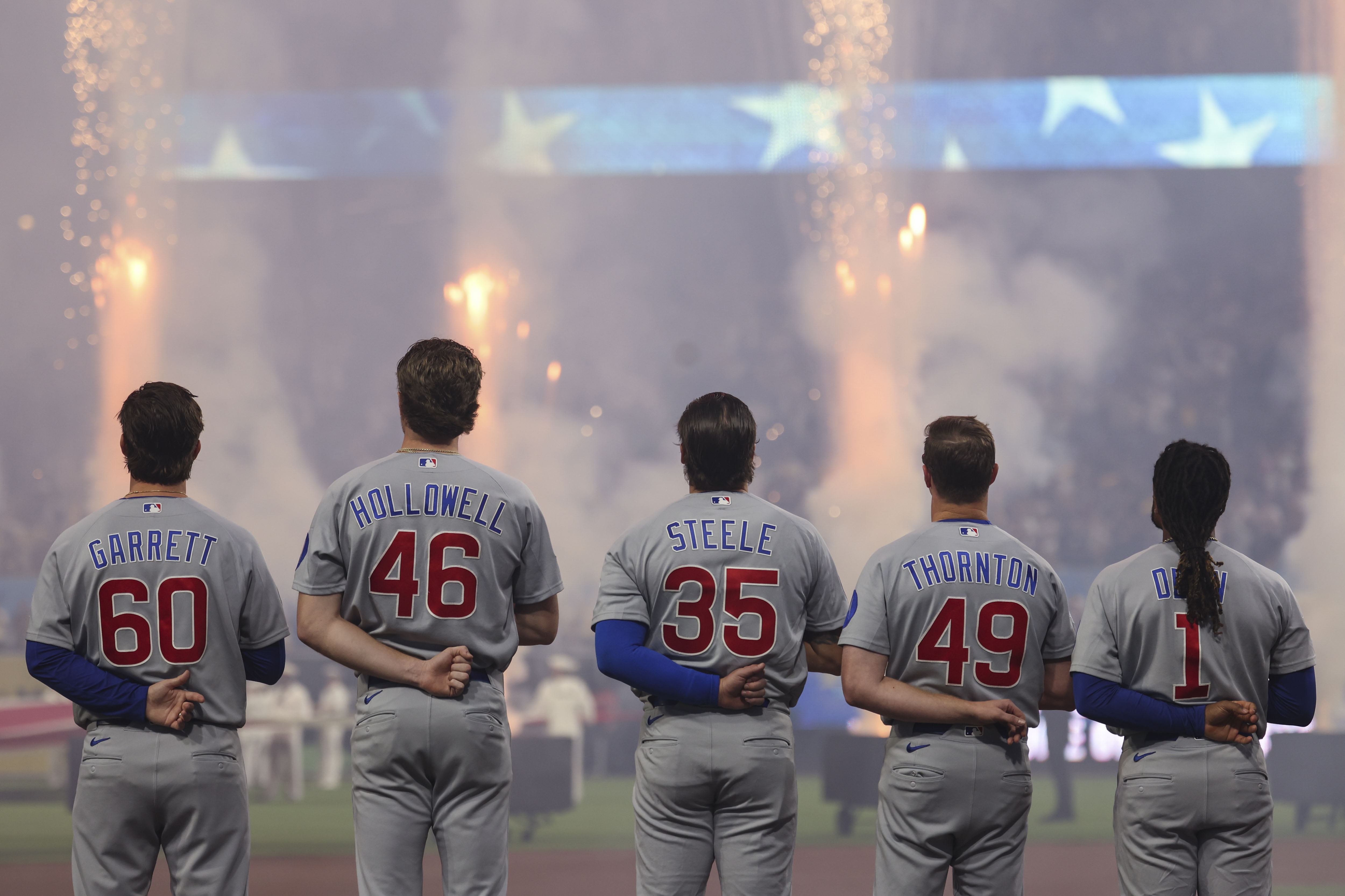 Cubs players watch fireworks before Game 1 of their wild-card series against the Padres on Sept. 29, 2026, in San Diego. (Brian Cassella/Chicago Tribune)