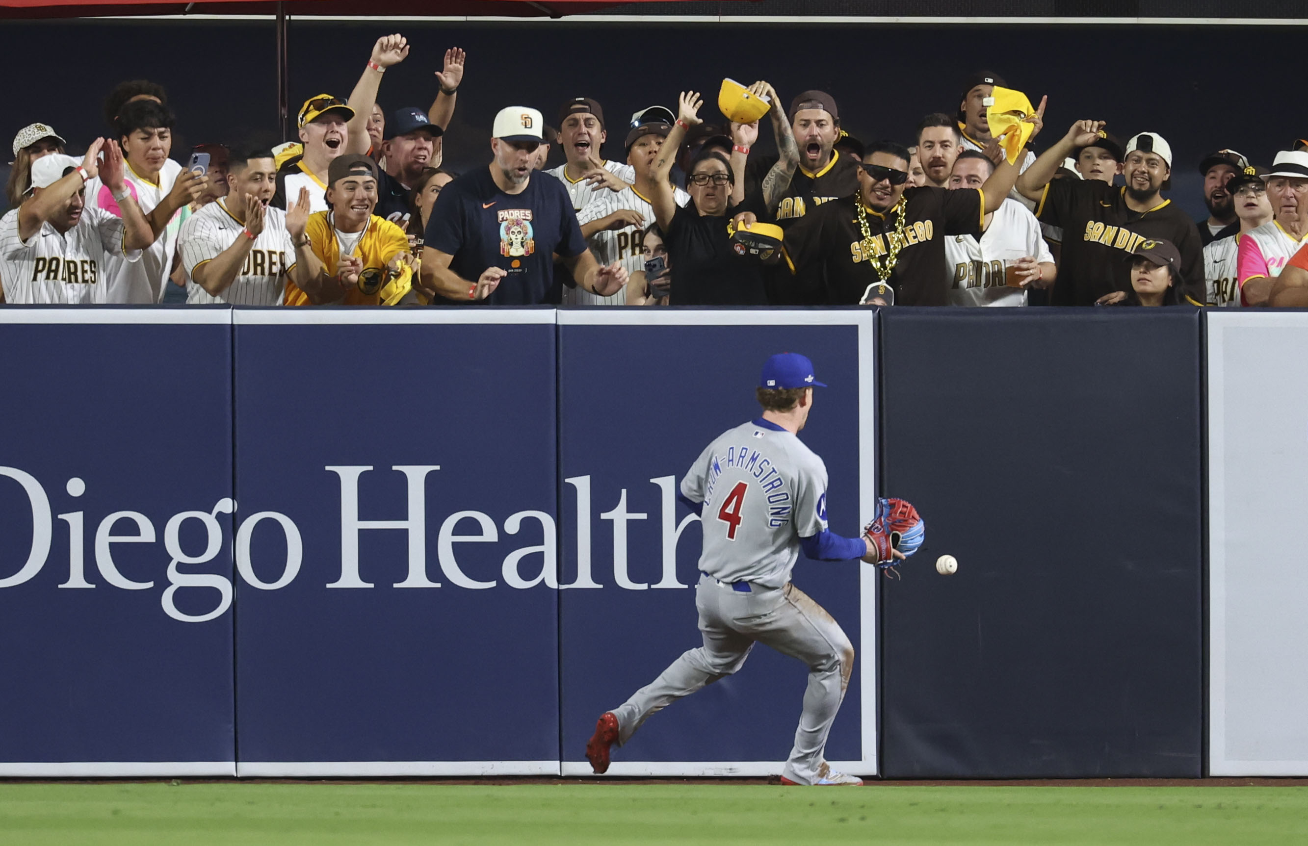Cubs center fielder Pete Crow-Armstrong chases an RBI double by Padres third baseman Manny Machado in the third inning in Game 1 of their wild-card series on Sept. 29, 2026, in San Diego. (Brian Cassella/Chicago Tribune)