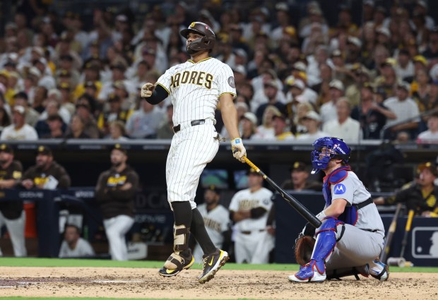 Padres shortstop Xander Bogaerts hits a home run against the Cubs in the fourth inning in Game 1 of their wild-card series on Sept. 29, 2026, in San Diego. (Brian Cassella/Chicago Tribune)