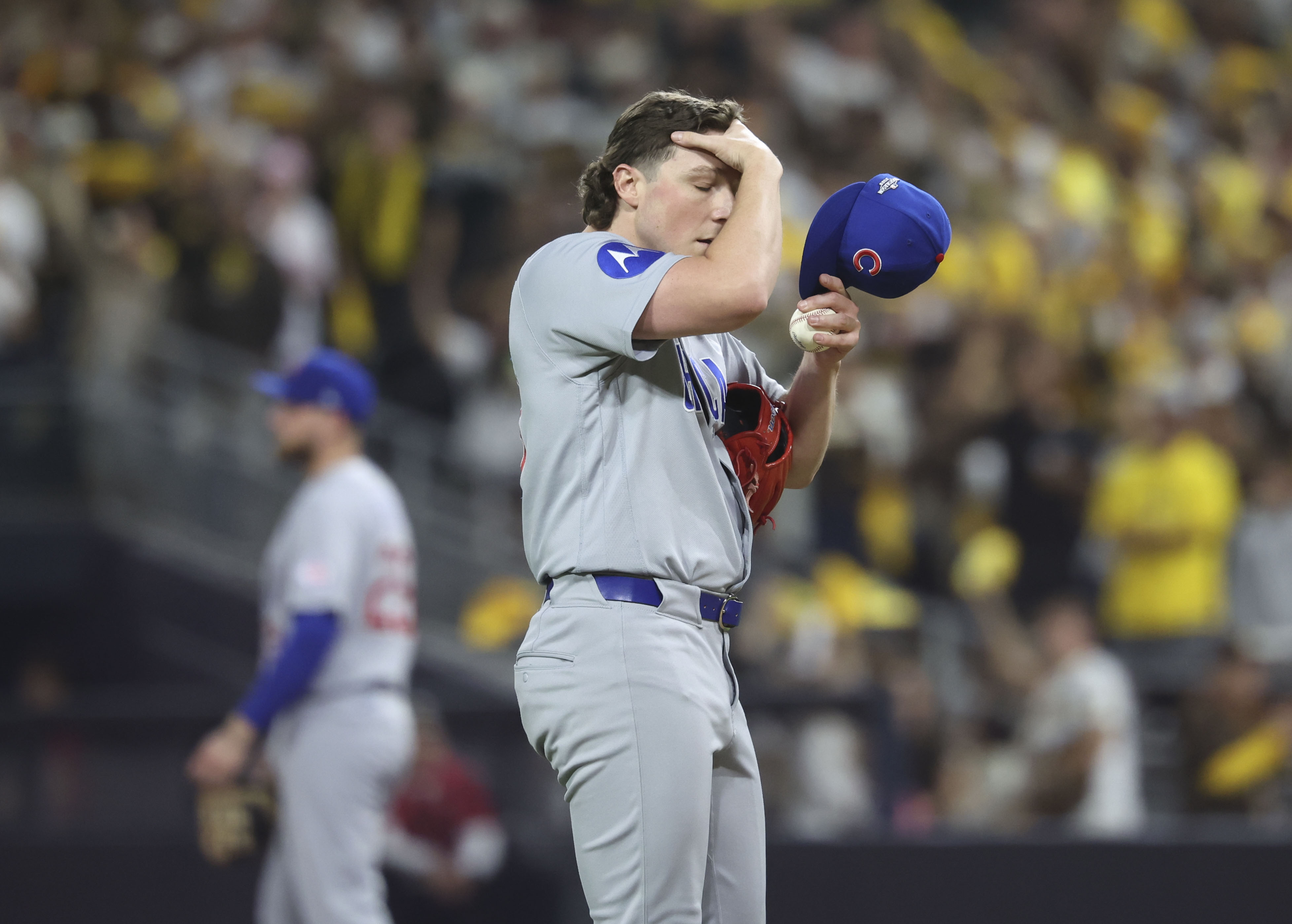 Cubs pitcher Ryan Rolison regroups as he struggles through the fifth inning against the Padres in Game 1 of their wild-card series on Sept. 29, 2026, in San Diego. (Brian Cassella/Chicago Tribune)