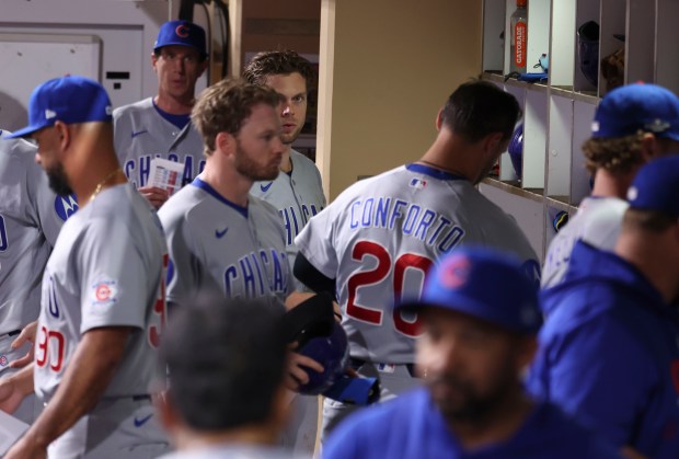 Players pack up in the Cubs dugout after dropping Game 1 of their wild-card series to the Padres on Sept. 29, 2026, in San Diego. (Brian Cassella/Chicago Tribune)