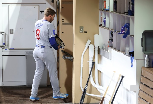 Ian Happ leaves the Cubs dugout after dropping Game 1 of their wild-card series to the Padres on Sept. 29, 2026, in San Diego. (Brian Cassella/Chicago Tribune)