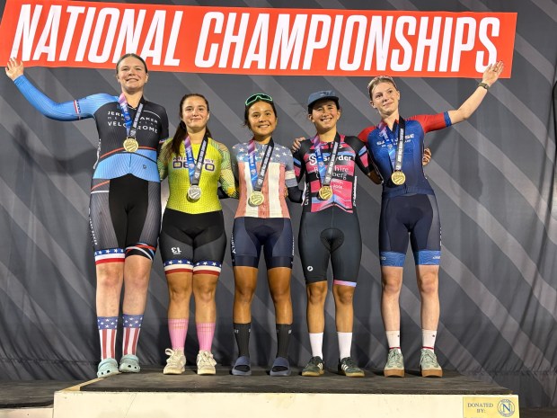 Aine Chen, center, won the title in the women's 15-16 individual pursuit at the USA Cycling Junior Track National Championships. (Courtesy Maison Chen)