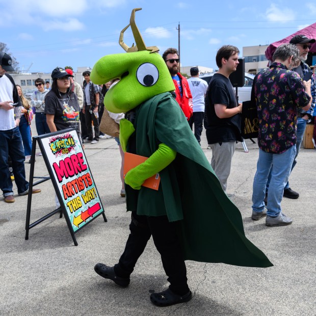 Ronic R., of Sacramento, is cosplaying Glep from Smiling Friends who is also dressed as Loki, as he attends the fourth annual Cape & Cowl Con held at Faction Brewing in Alameda, Calif., on Sunday, Aug. 30, 2026. The event is hosted by Oakland's Cape & Cowl Comics with 150 vendors, authors and artist attending. (Jose Carlos Fajardo/Bay Area News Group)