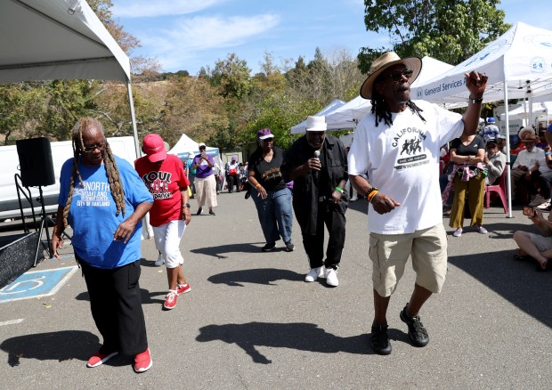 Seniors Matt Williams, of San Leandro, right, and Novella Peterson, of Richmond, line dance to the West Coast Blues Society band during the 23rd Annual Healthy Living Festival at the Oakland Zoo in Oakland, Calif., on Thursday, Sept. 24, 2026. (Jane Tyska/Bay Area News Group)