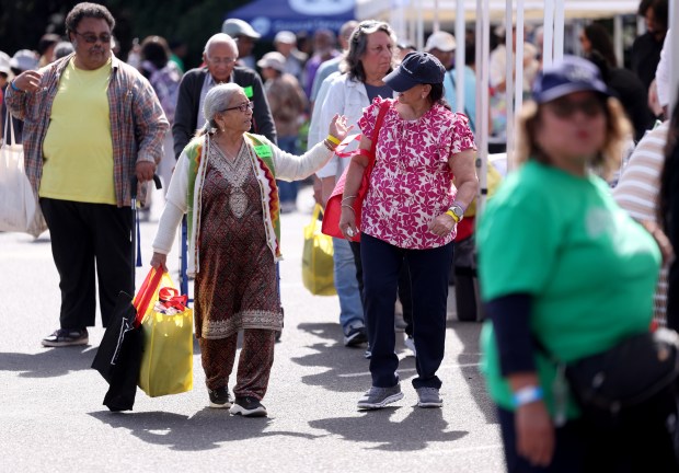 Seniors browse informational booths during the 23rd Annual Healthy Living Festival at the Oakland Zoo in Oakland, Calif., on Thursday, Sept. 24, 2026. (Jane Tyska/Bay Area News Group)