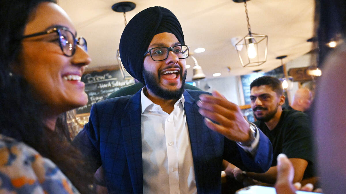 Fresno City Council District 7 candidate Nav Gurm, center, is seen during a campaign gathering at Sequoia Brewing in the Tower District Tuesday night, June 2, 2026 in Fresno. Fresno City Council District 7 candidate Nav Gurm, center, is seen during a campaign gathering at Sequoia Brewing in the Tower District Tuesday night, June 2, 2026 in Fresno.
