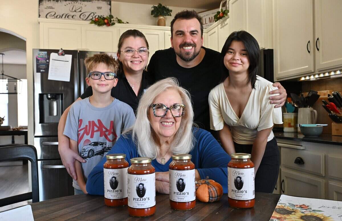 Susanne Foster, center, with Richard and Nancy Burchfiel, top, and their children Hannah and Logan, have started offering Marie Pizzio's Pasta Sauce Gravy, a pasta sauce based on a family recipe. Photographed Friday, Sept. 4, 2026 in Clovis.