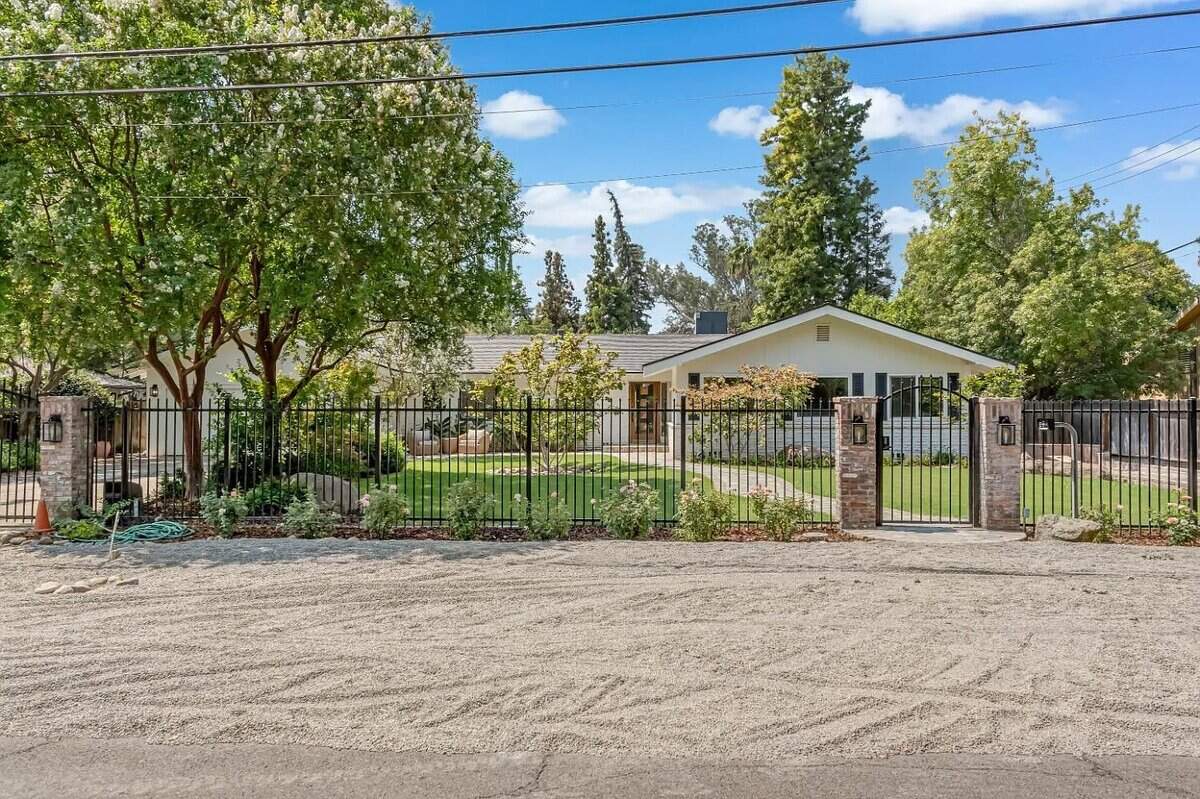 Home for sale at 4949 N. Wishon Court in Fresno's Old Fig neighborhood. Listed as a 2,324 square-foot home with four bedrooms, three bathrooms and a price tag of $1,250,000.