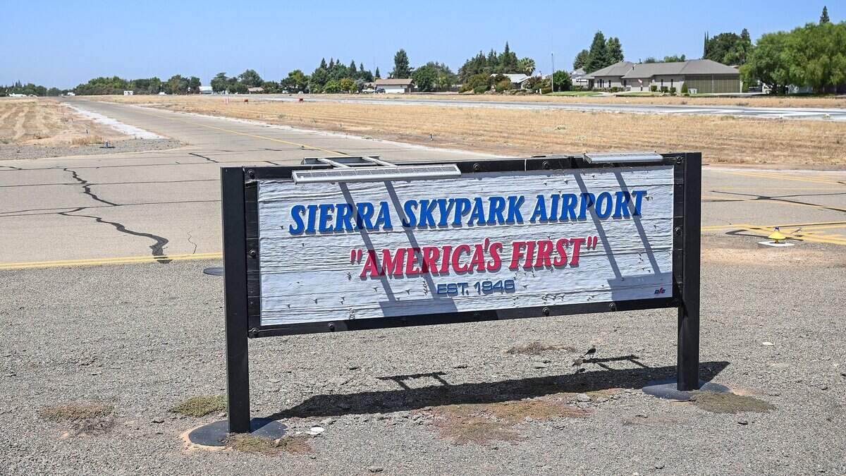 A sign on Herndon Avenue near Blythe in northwest Fresno denotes Sierra Sky Park is described as the world's first residential fly-in aviation community. Photographed on Tuesday, Sept. 8, 2026.