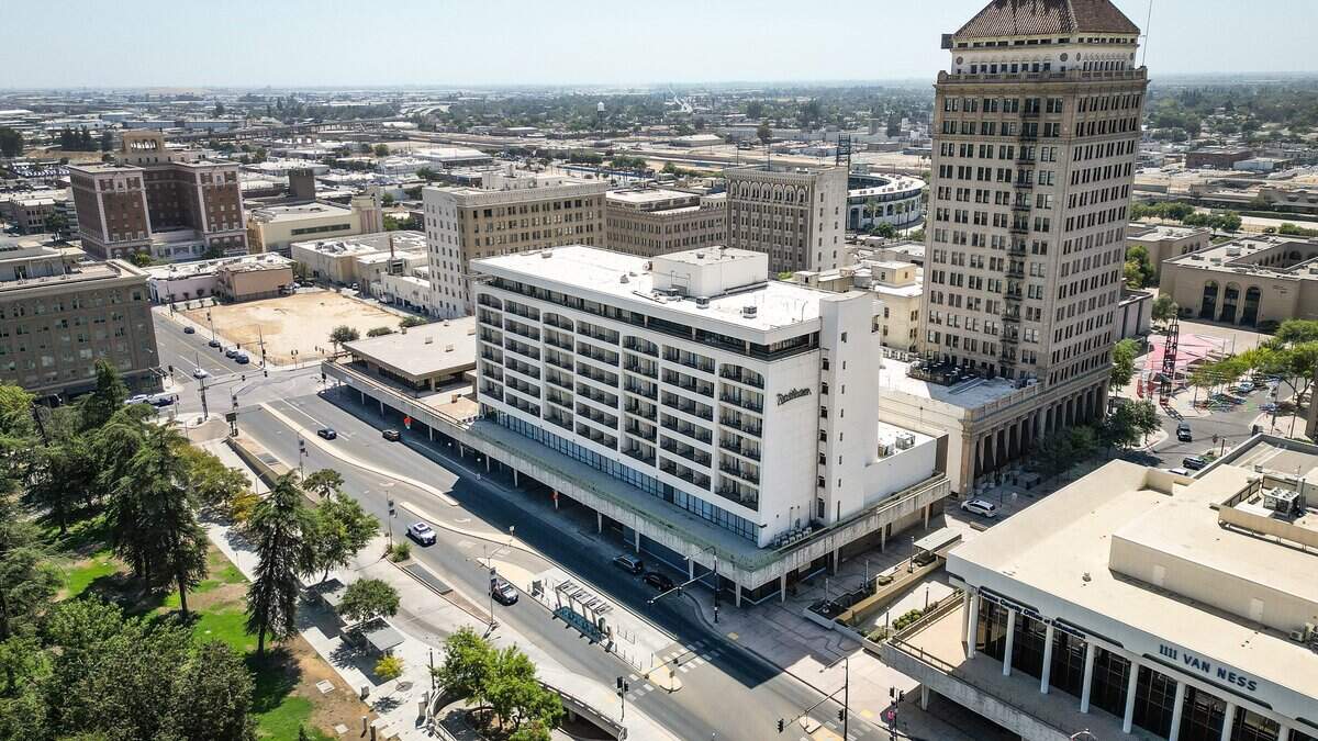 The Radisson Hotel building, center, on Van Ness in downtown Fresno is again listed for sale. It was listed last fall with a price of $14.9 million, then it was taken off the market. On Aug. 21 it was listed for sale again, this time for $19.5 million.