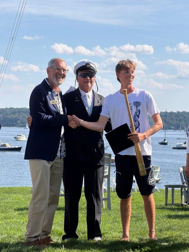 From left to right, 2027 Congressional Cup Chair Tom Camp, Seawanhaka Corinthian Yacht Club Commodore Julian Fisher II, and Josh Hyde, the winning skipper of the 2026 Grand Slam. The Baseball Bat is the trophy presented to the Grand Slam winner. (Courtesy photo)